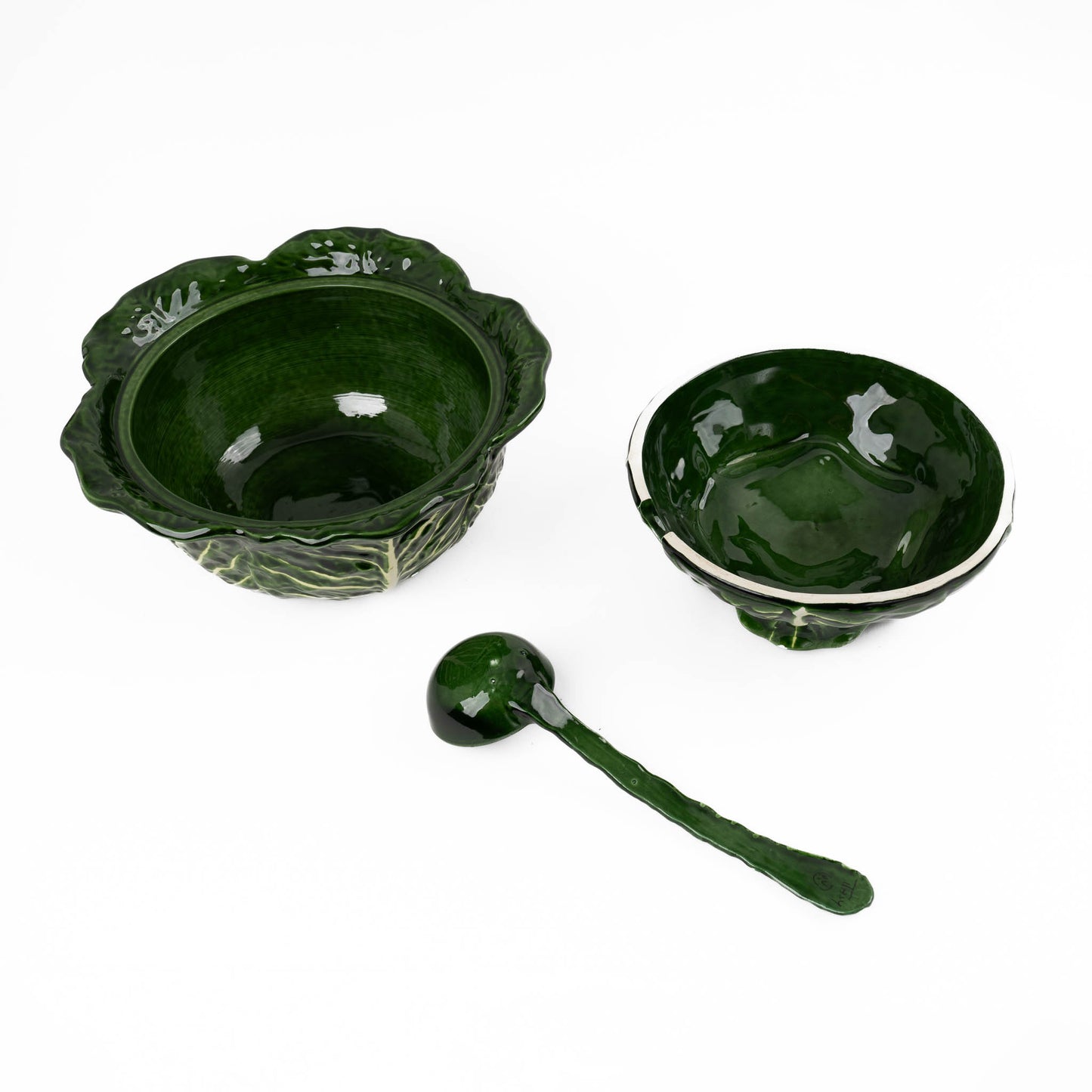 Vintage Italian majolica ceramic tureen shaped like a green cabbage with detailed leaf texture, shown with matching lid and serving spoon