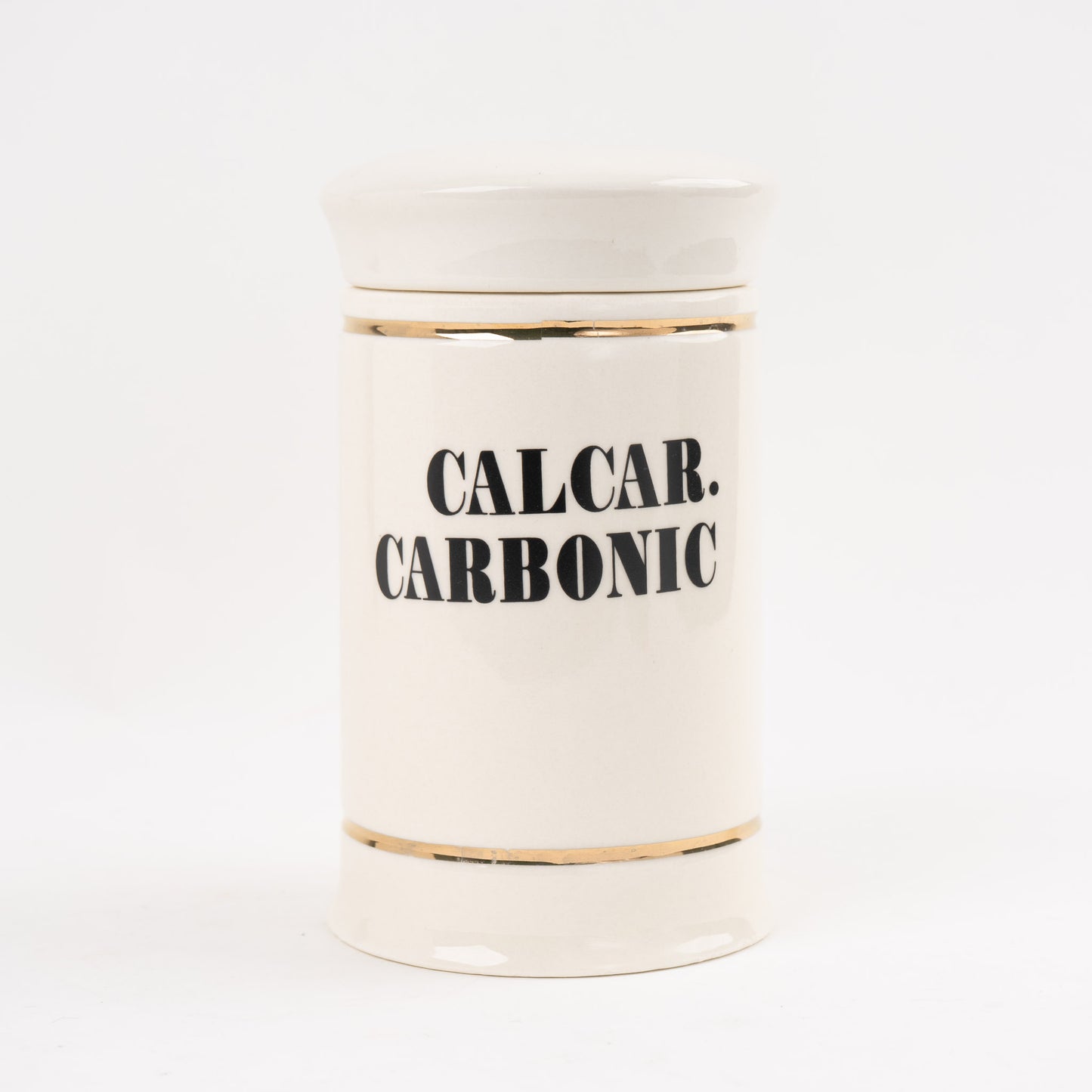 Calcar. Carbonic apothecary jar with gold stripes and black vintage lettering with matching lid