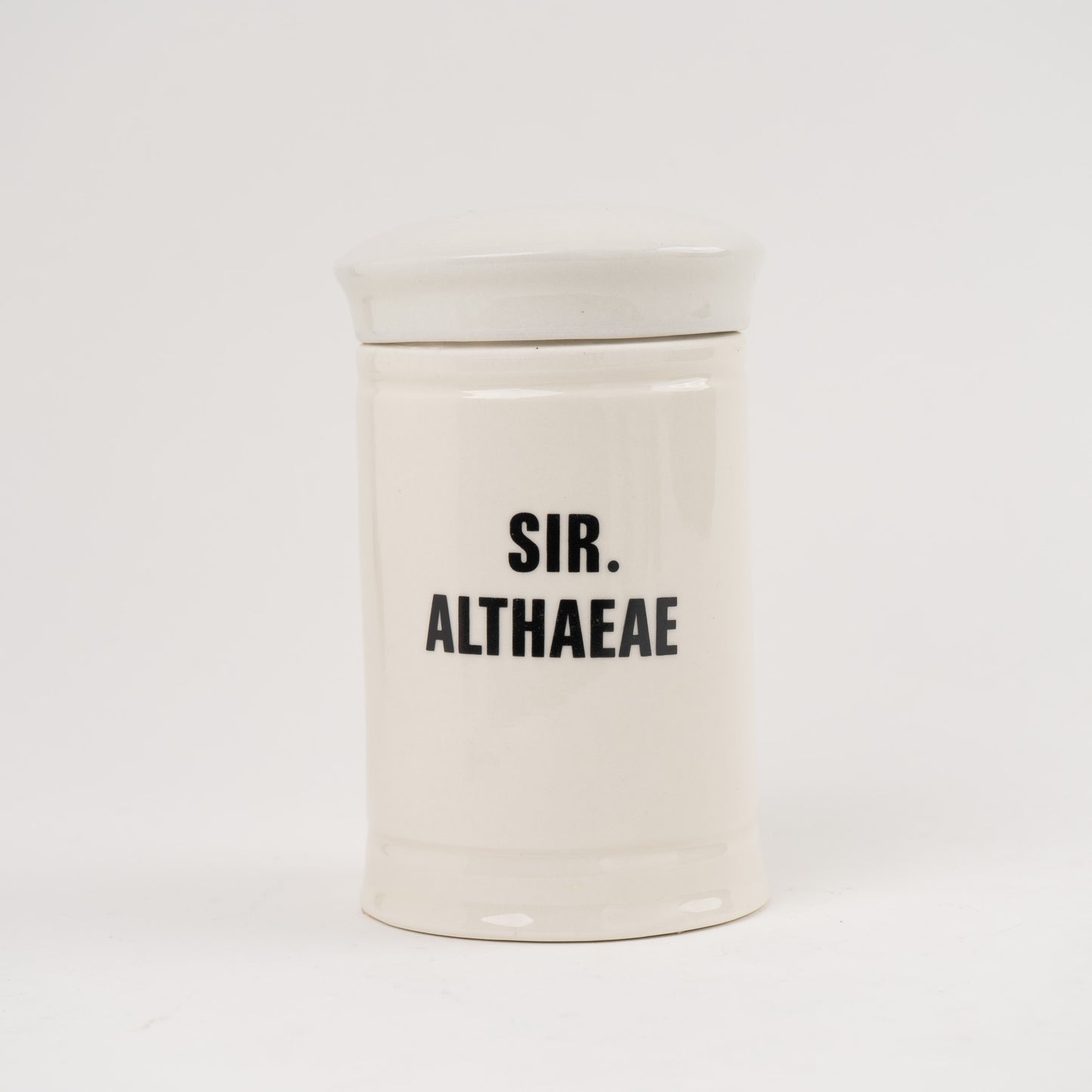 Sir Althaeae Off-white ceramic apothecary jar with black vintage lettering and matching lid
