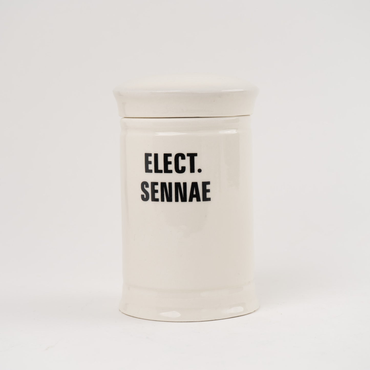 Elect Sennae Off-white ceramic apothecary jar with black vintage lettering and matching lid