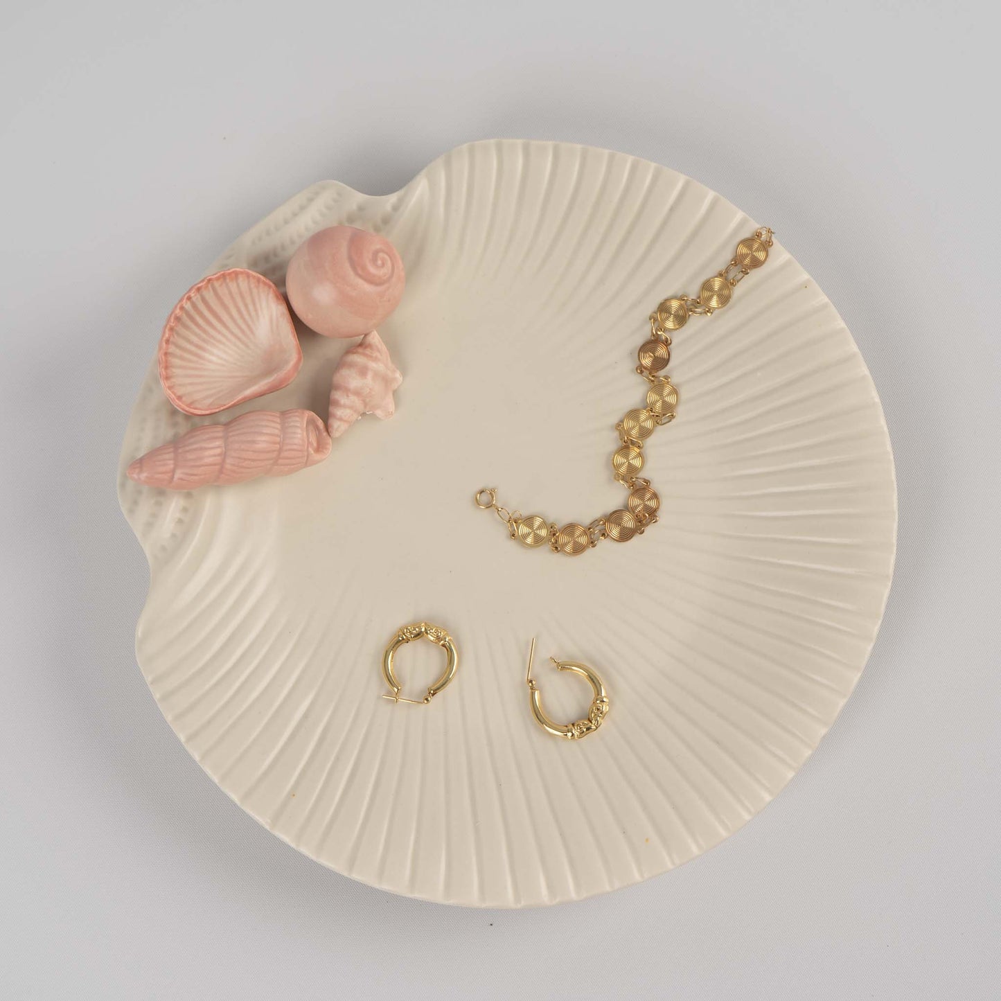 Vintage 1976 Fitz and Floyd ceramic seashell plate in off white with soft pink shell details