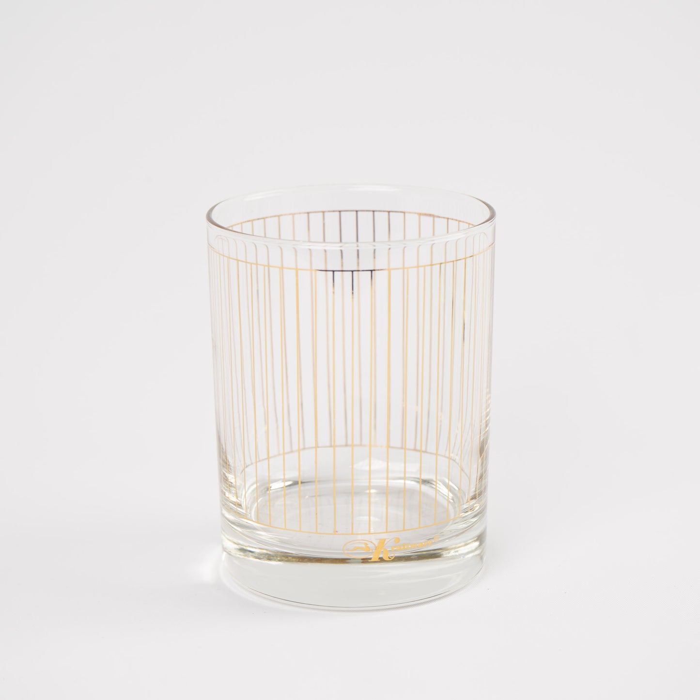 Vintage lowball glasses with thin gold stripe pattern, set of 9 pieces marked Kraftware from 1960s-1970s