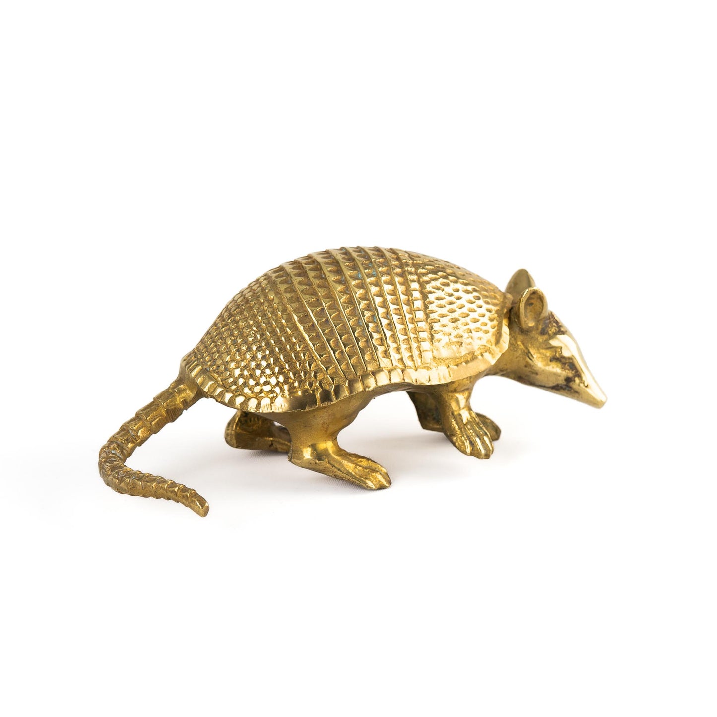 Vintage solid cast brass armadillo figurine with detailed segmented shell, circa 1970s–1980s