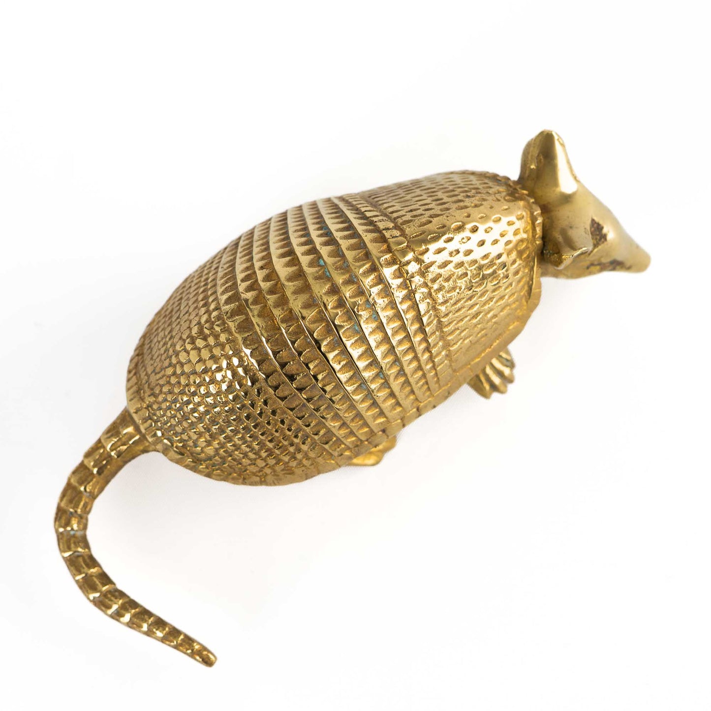 Vintage solid cast brass armadillo figurine with detailed segmented shell, circa 1970s–1980s - top view of armor 