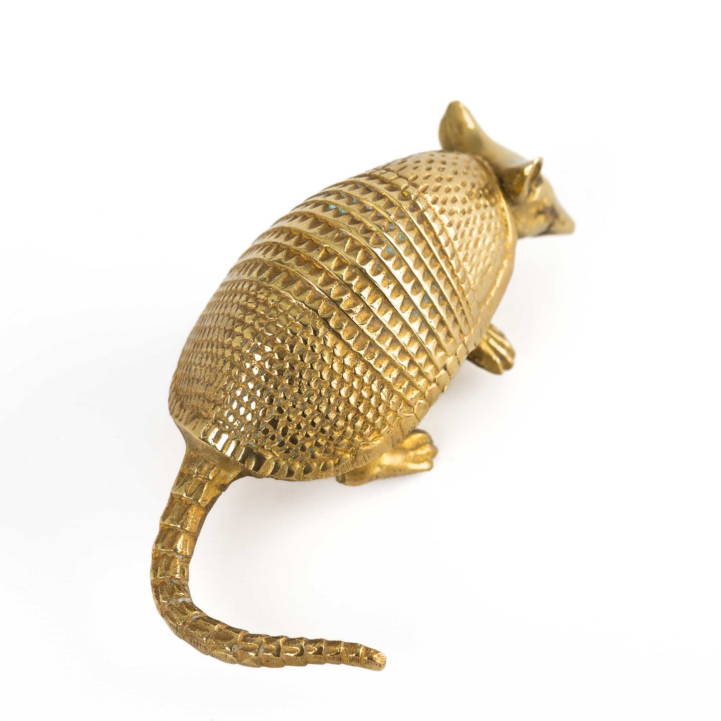 Vintage solid cast brass armadillo figurine with detailed segmented shell, circa 1970s–1980s