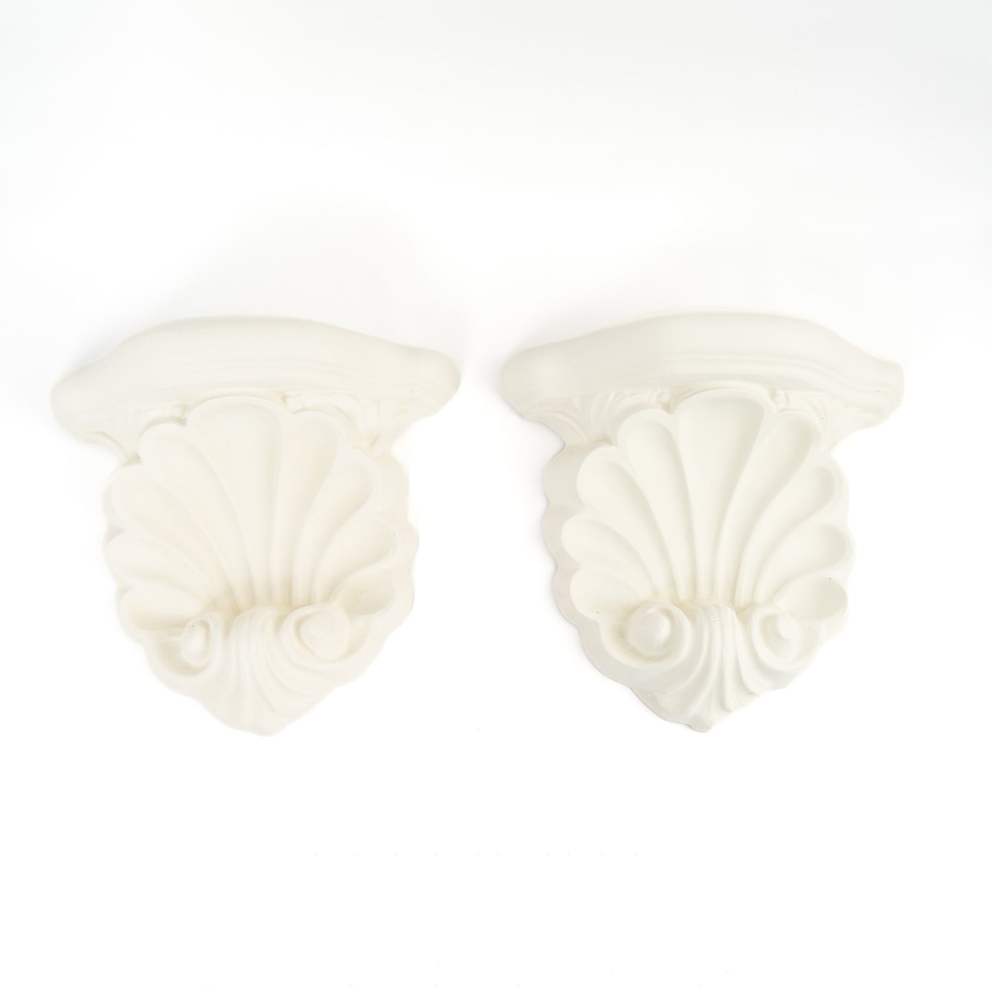 Pair of vintage white plaster shell scroll corbel wall shelves 