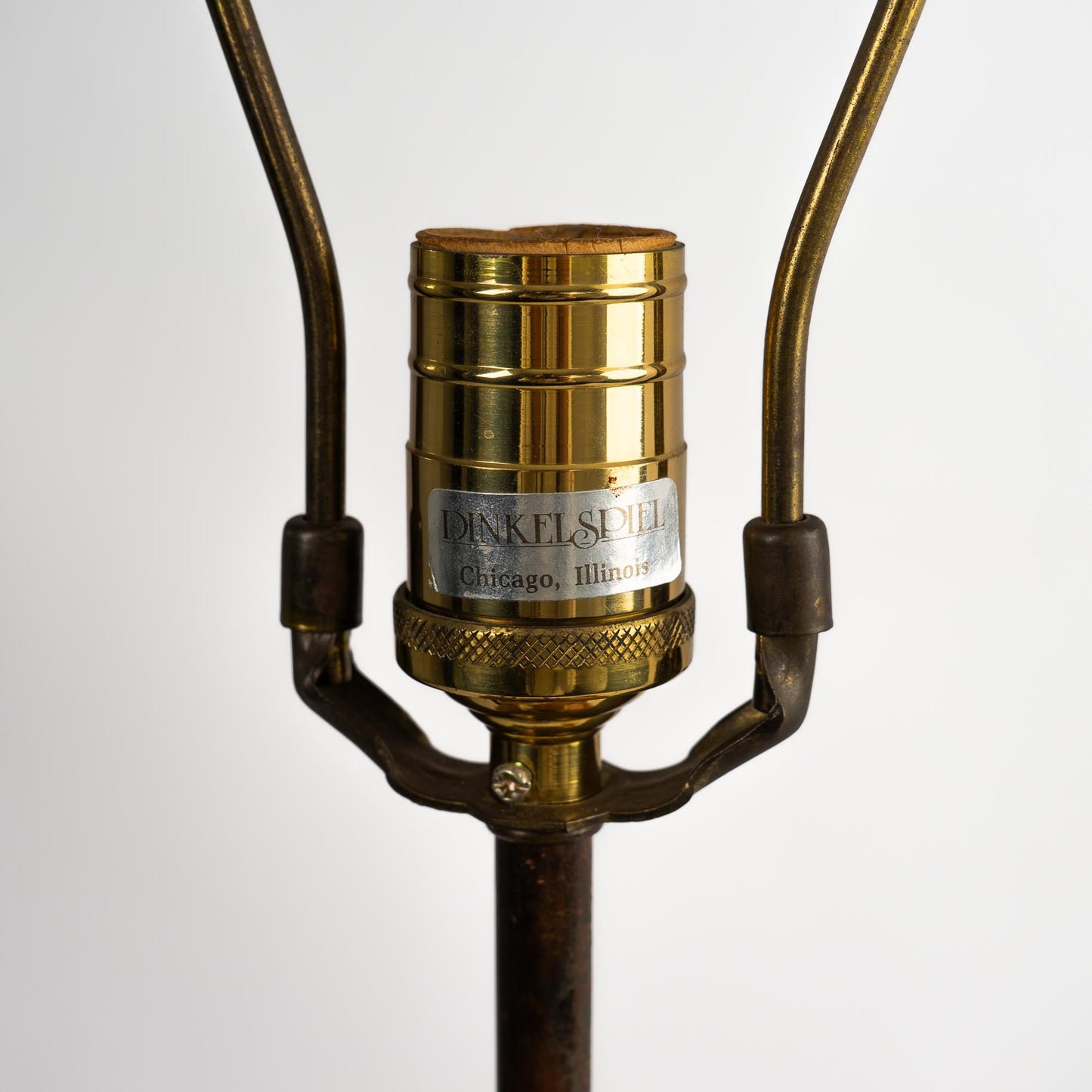  Vintage neoclassical athénienne table lamp with red Italian marble egg orb on dark bronze tripod base and ivory pleated shade - close up of socket 