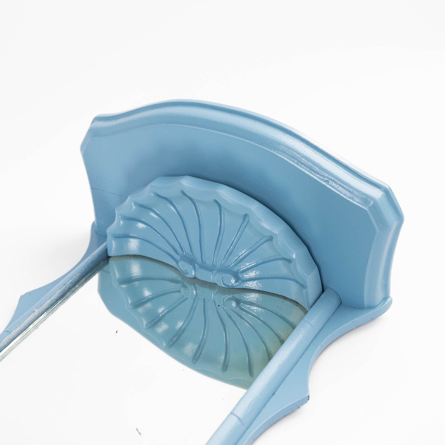 Vintage light blue pagoda-shaped wall shelves with mirrors - close up shell detail