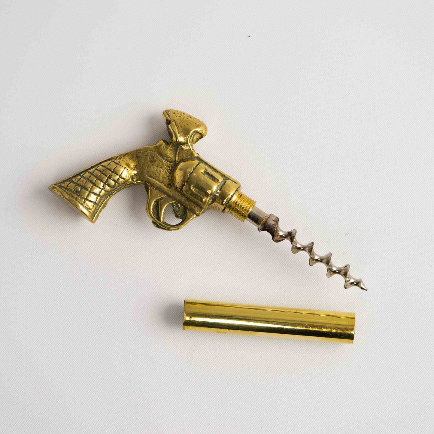 Vintage brass revolver-shaped corkscrew beer bottle opener 