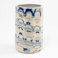 Vintage cylindrical Nerikomi marbled ceramic vase with swirling blue, green, and pink tones on an off-white ground, signed and dated 1982.