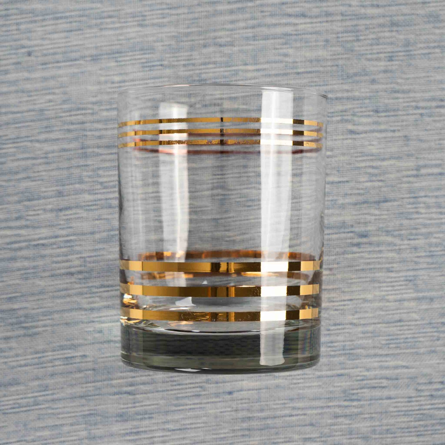  vintage lowball cocktail glass with horizontal gold stripes 