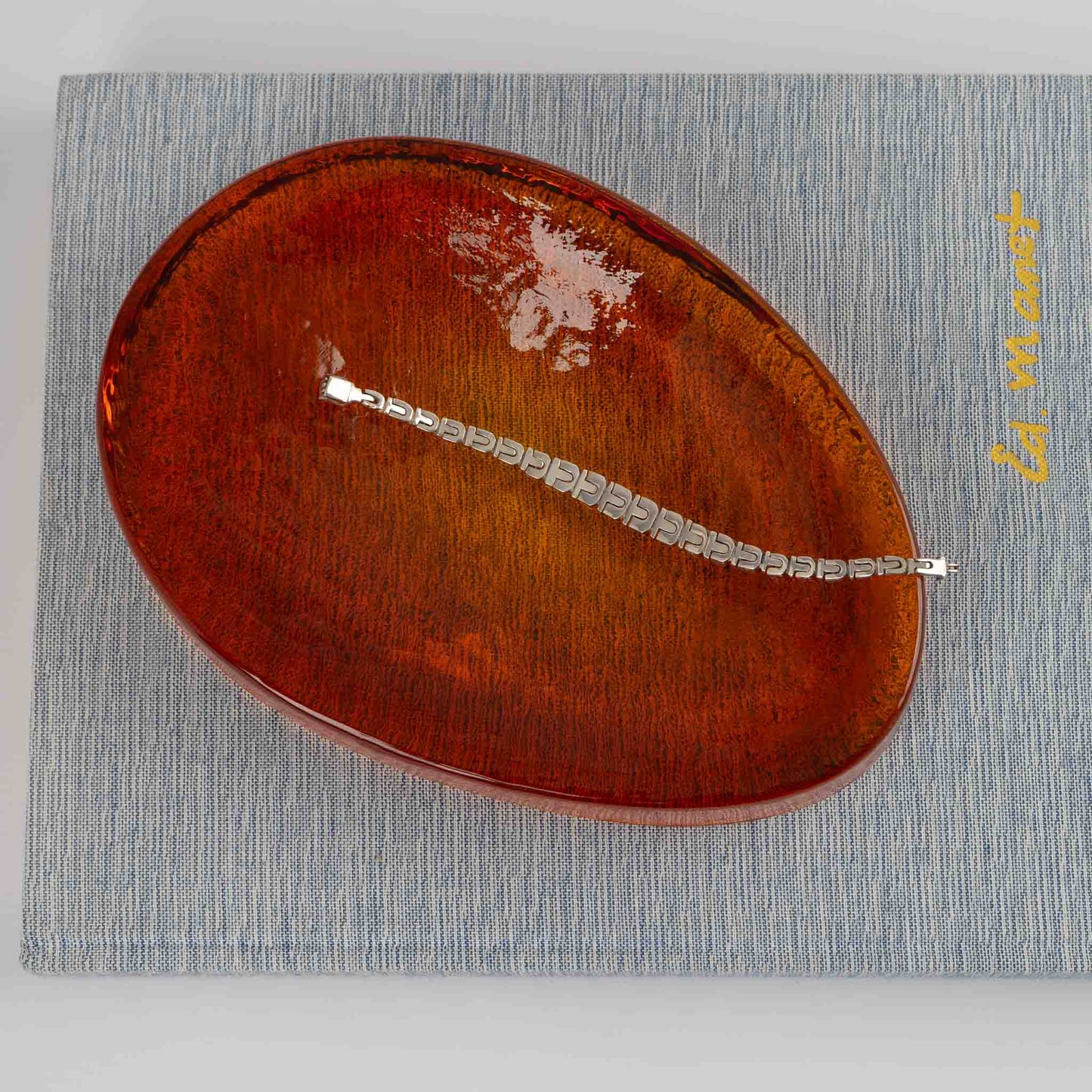 Vintage amber Murano glass freeform catchall bowl by Vincenzo Nason from the 1970s, featuring organic curved shape and textured glass surface with artist signature