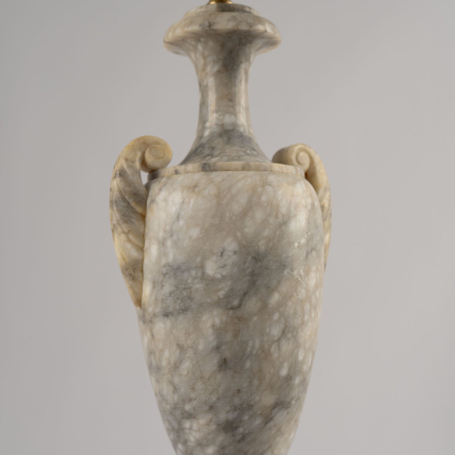 Vintage 1950s neoclassical marble table lamp with urn shape, side handles, and tiered square base 