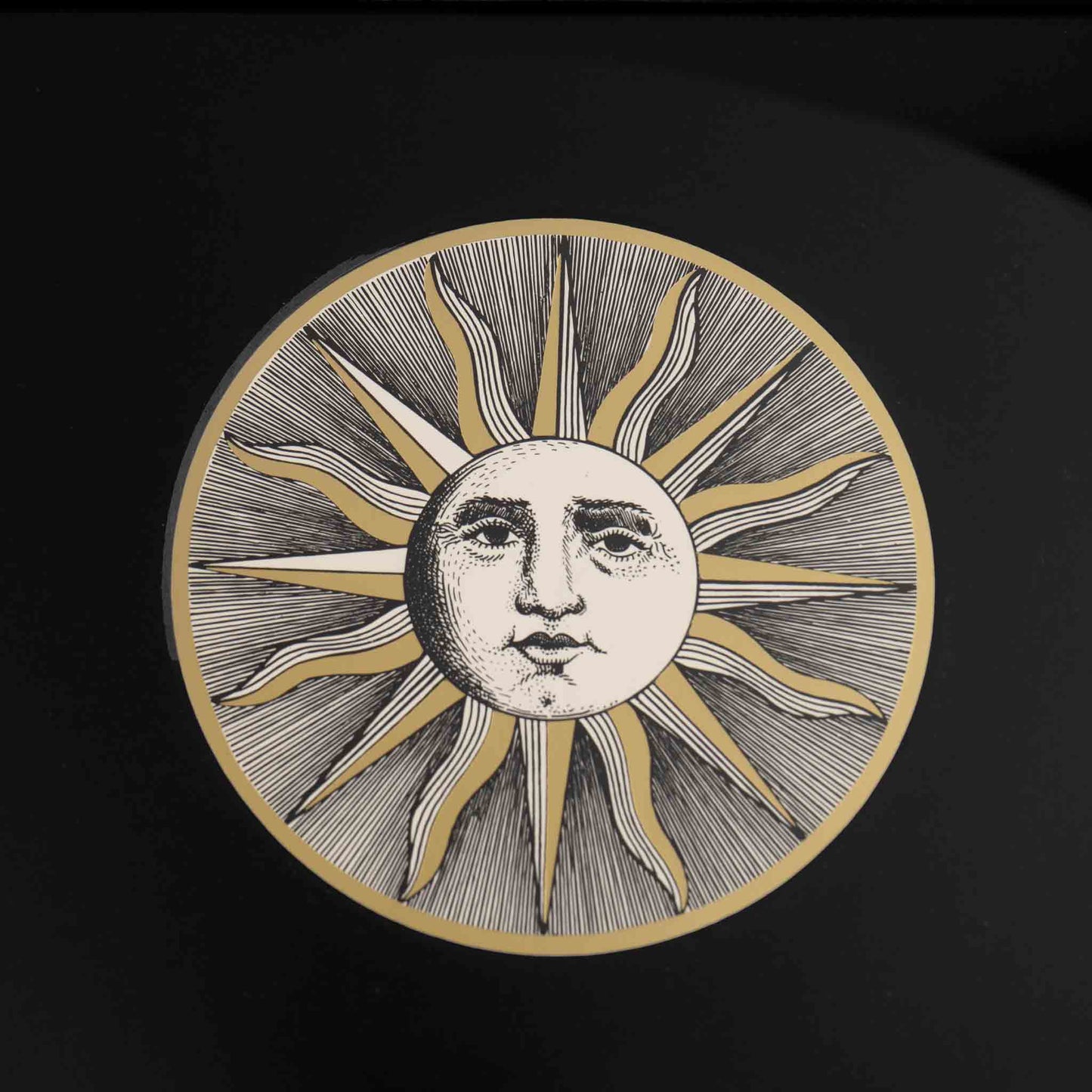 Vintage Piero Fornasetti Sole VI framed etching showing stylized sun face design in black frame with gold accent and black mat, from the famous Soli e Lune series