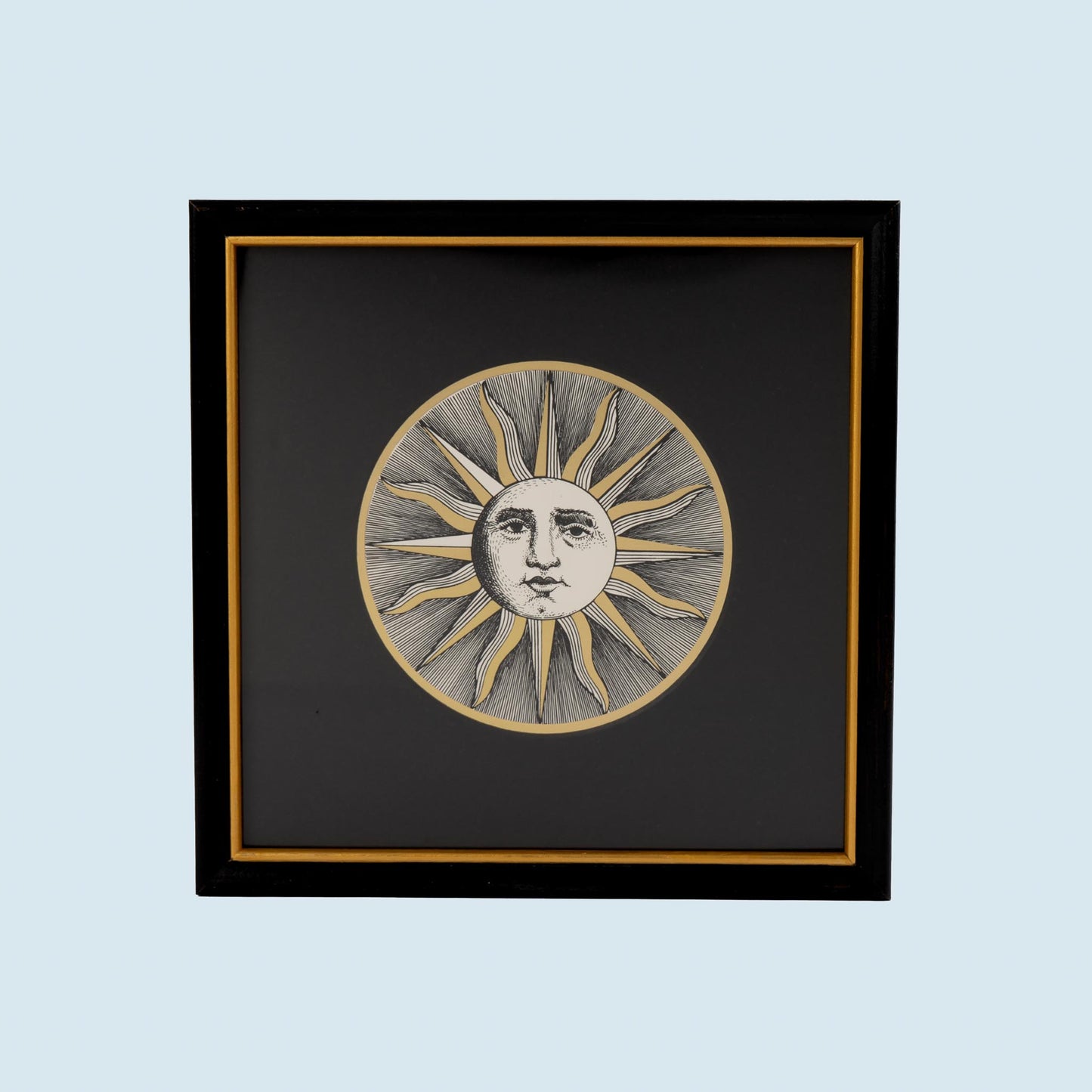Vintage Piero Fornasetti Sole VI framed etching showing stylized sun face design in black frame with gold accent and black mat, from the famous Soli e Lune series
