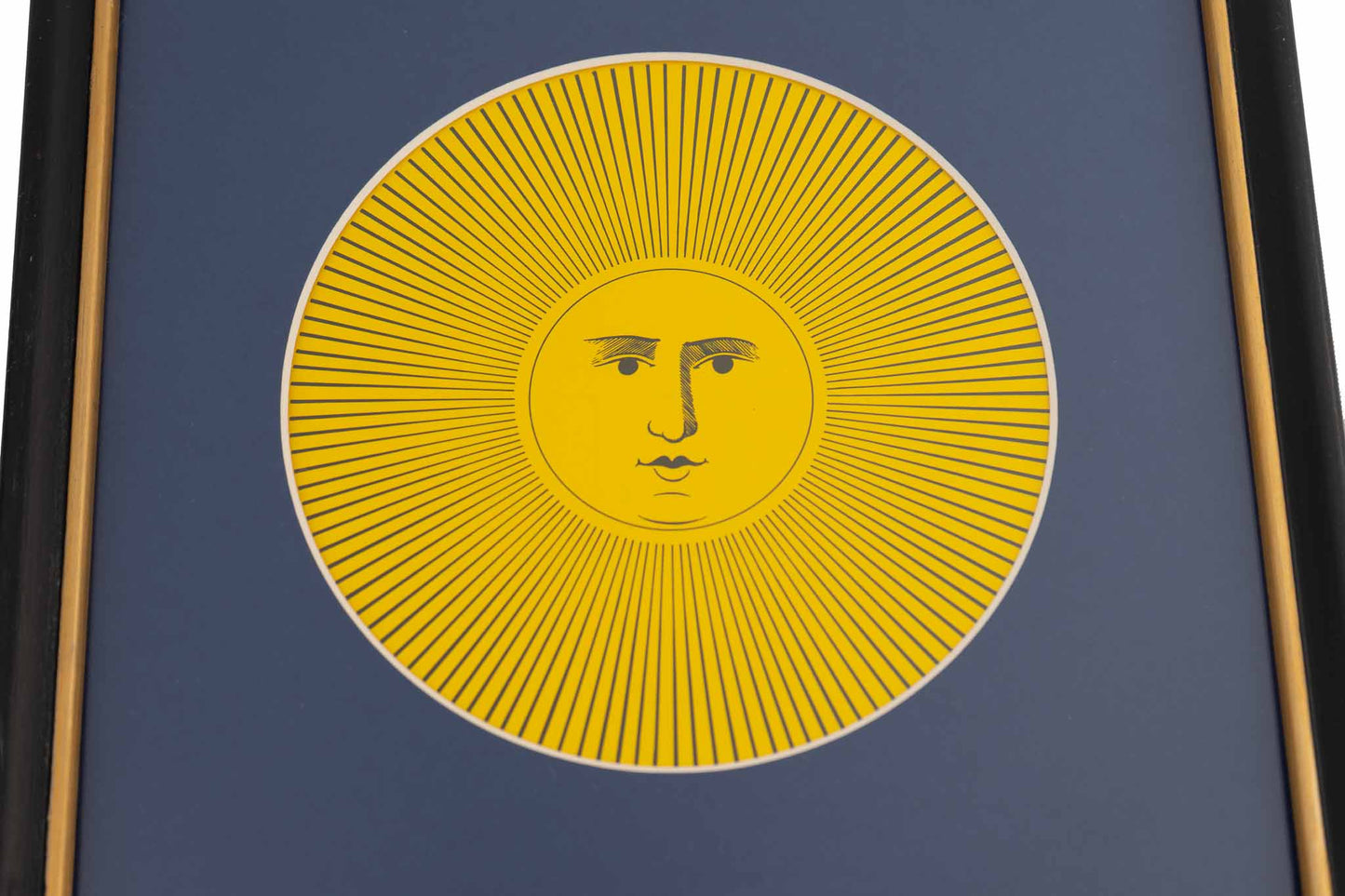 Vintage Piero Fornasetti Sol XI sun print featuring intricate black line art on white paper, displayed in black frame with gold accent and blue mat