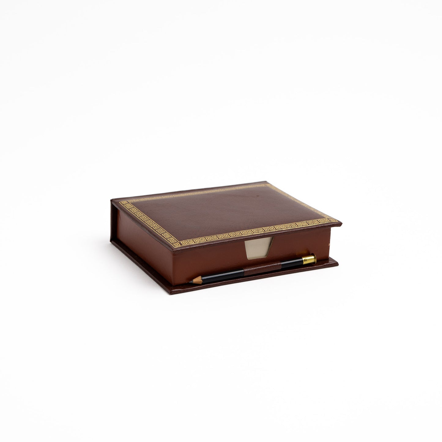 A dark brown leather notecard  holder. with gold Greek key border detailing