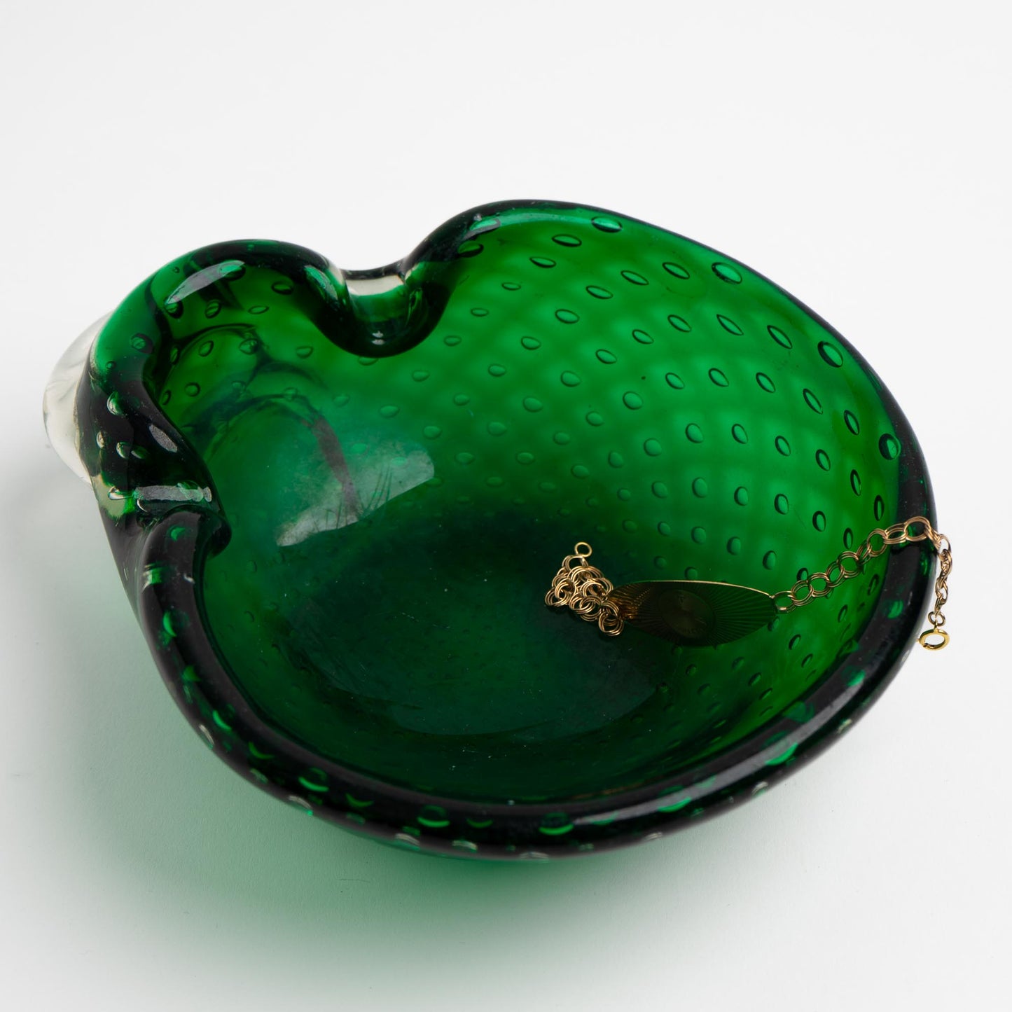 Vintage emerald green Murano glass bullicante catchall dish with controlled bubble pattern