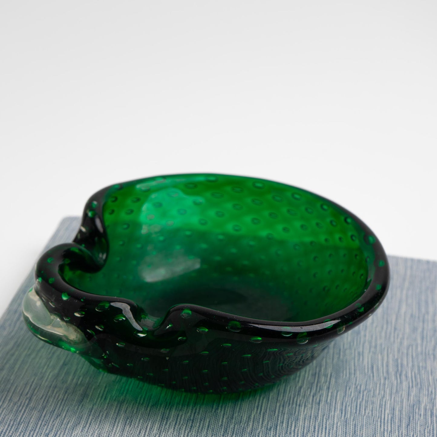 Vintage emerald green Murano glass bullicante catchall dish with controlled bubble pattern