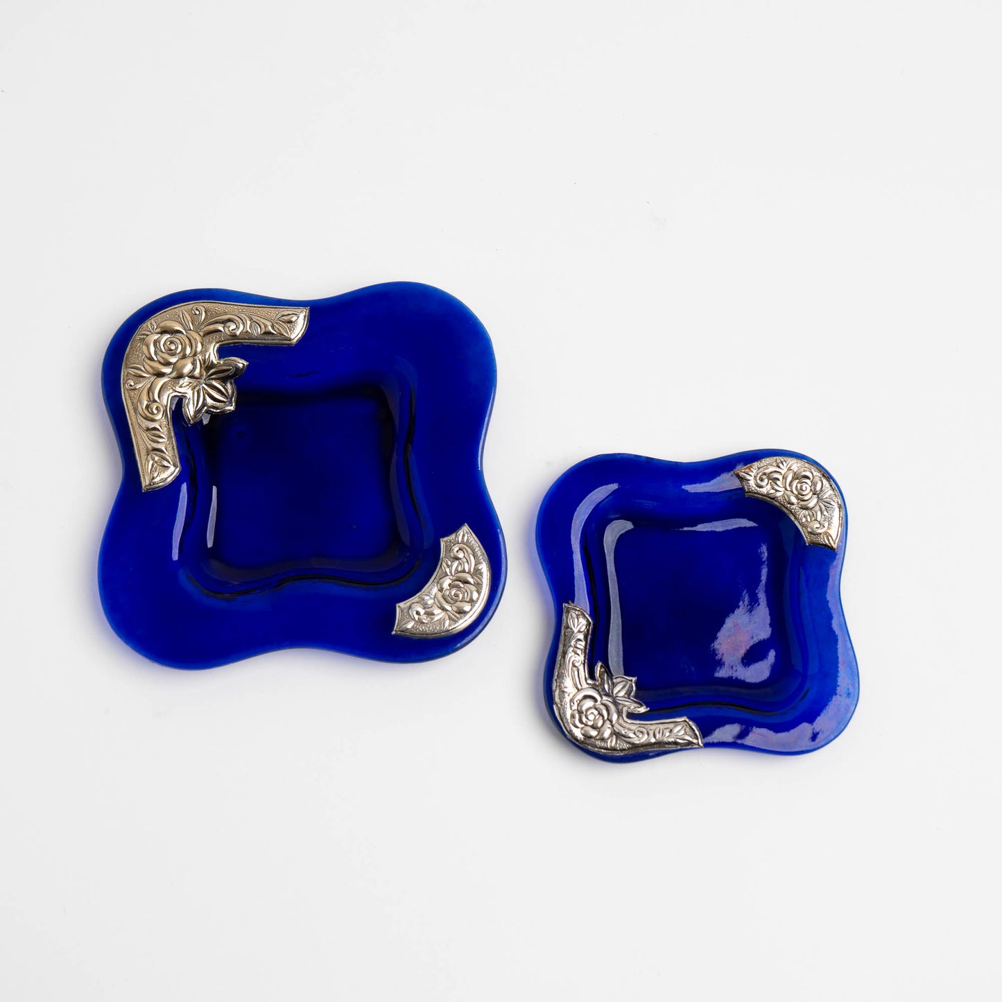 Set of two vintage cobalt blue square glass catchalls with silver-plated floral rose overlay design