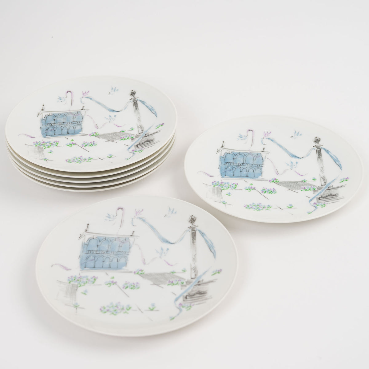 Stack of seven vintage Rosenthal Plaza salad plates with blue and purple mid-century architectural design