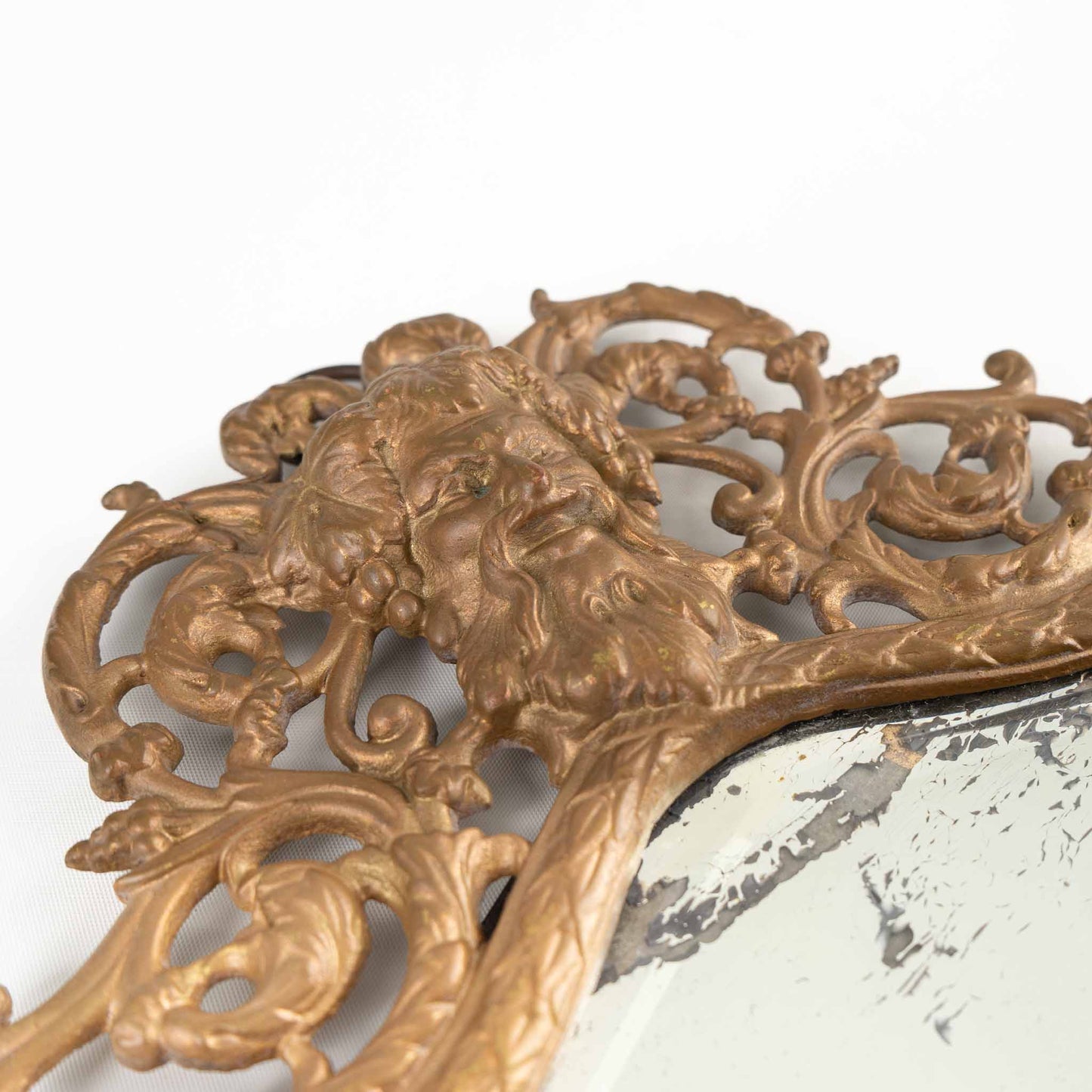 Antique 1890s P.E. Guerin Rococo Brass Wall Mirror -  Bacchus, the Roman God of wine and revelry.