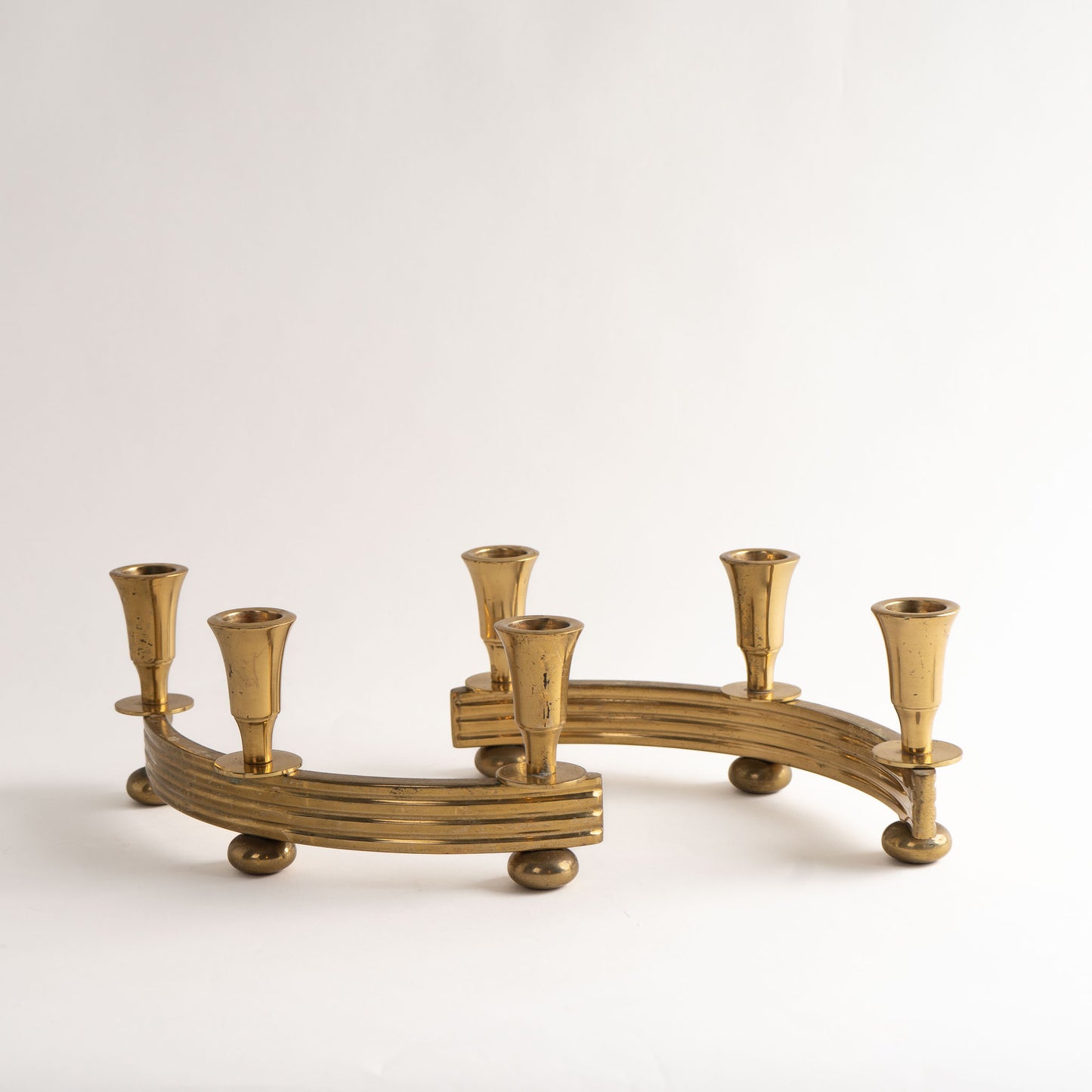Vintage Mid-Century Curved Dirilyte Brass Candlestick Pair