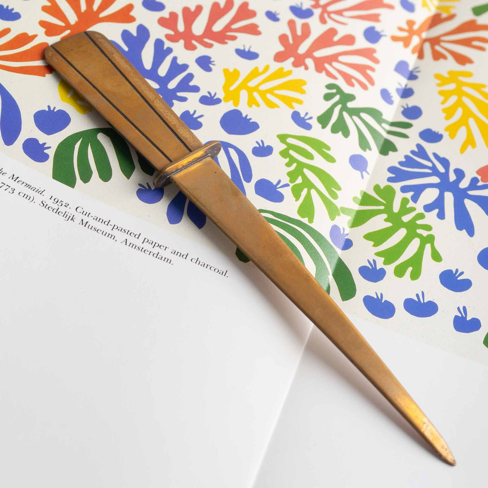 
                      
                        Vintage Brass Letter Opener with Striped Handle
                      
                    