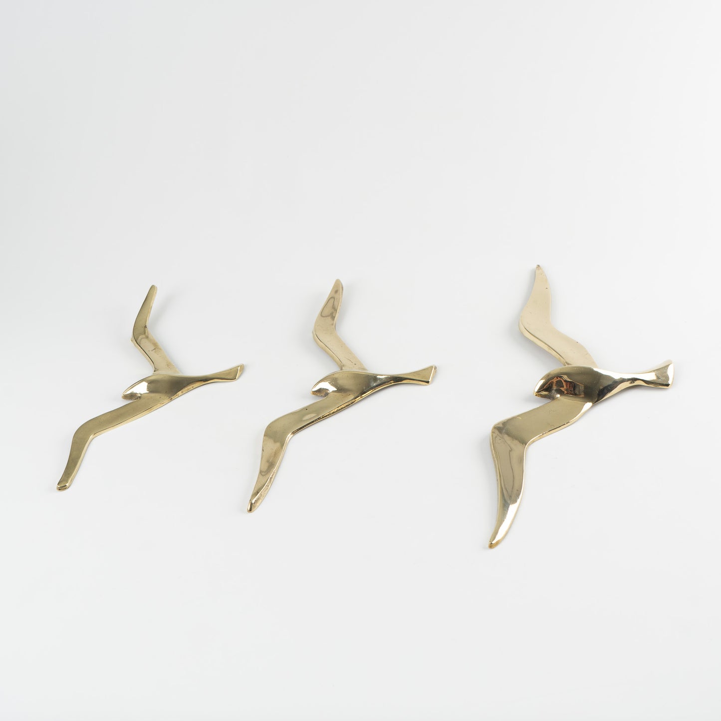 Load image into Gallery viewer, Vintage Brass Birds  focal point on wall 
