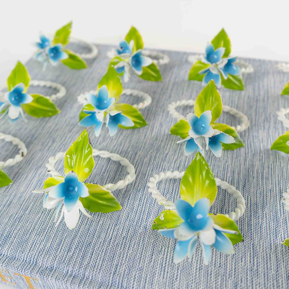 
                      
                        Vintage Italian Tole Floral Napkin Ring  Blue and White flowers with green  leaves
                      
                    