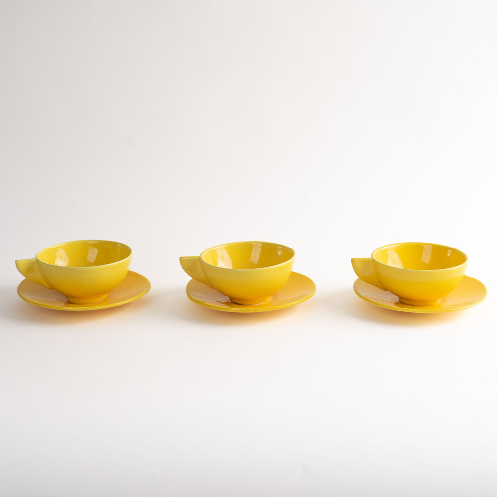 
                      
                        Vintage Mid-Century Modern Yellow Triangle-Handle Coffee Cups and Saucers
                      
                    