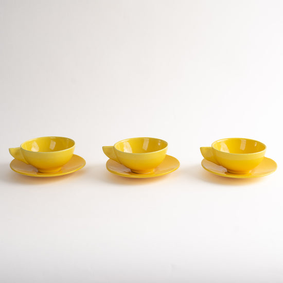 Vintage Mid-Century Modern Yellow Triangle-Handle Coffee Cups and Saucers