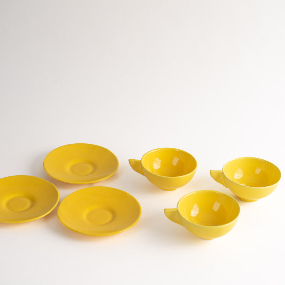 
                      
                        Vintage Mid-Century Modern Yellow Triangle-Handle Coffee Cups and Saucers
                      
                    