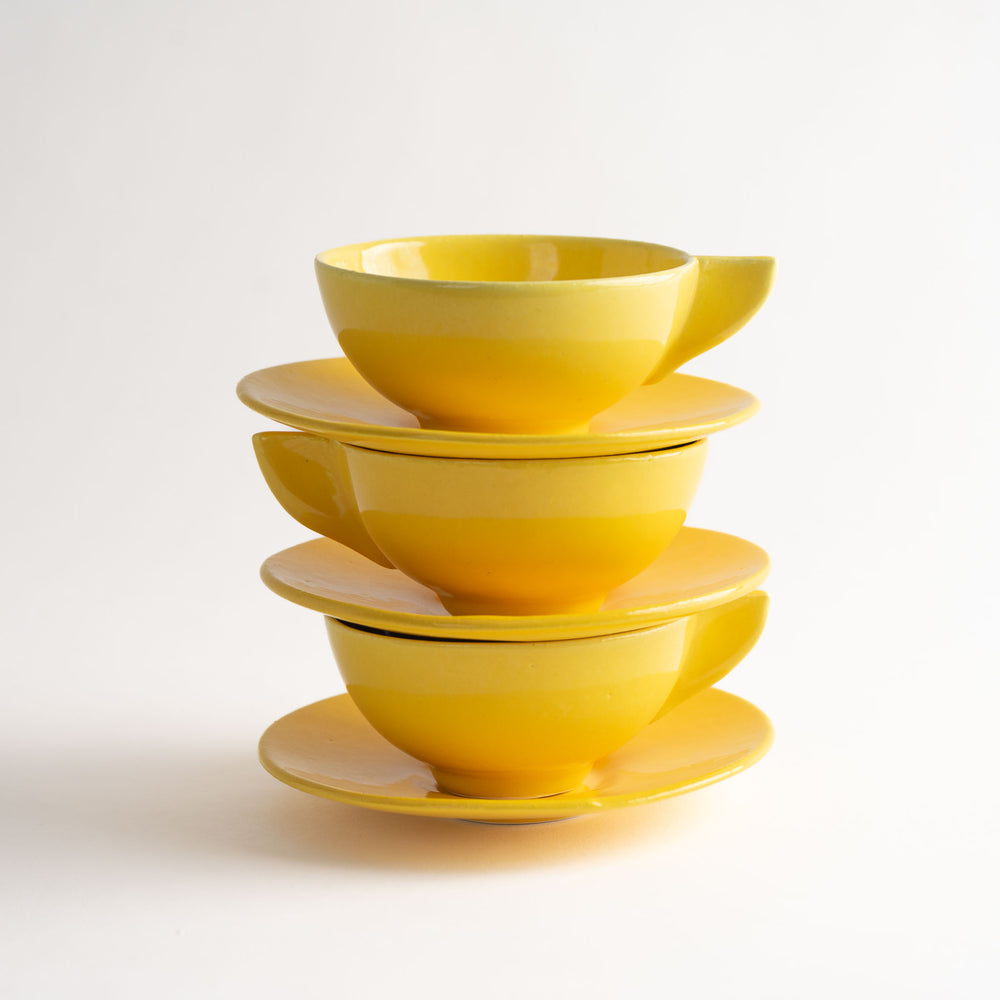 
                      
                        Vintage Mid-Century Modern Yellow Triangle-Handle Coffee Cups and Saucers
                      
                    