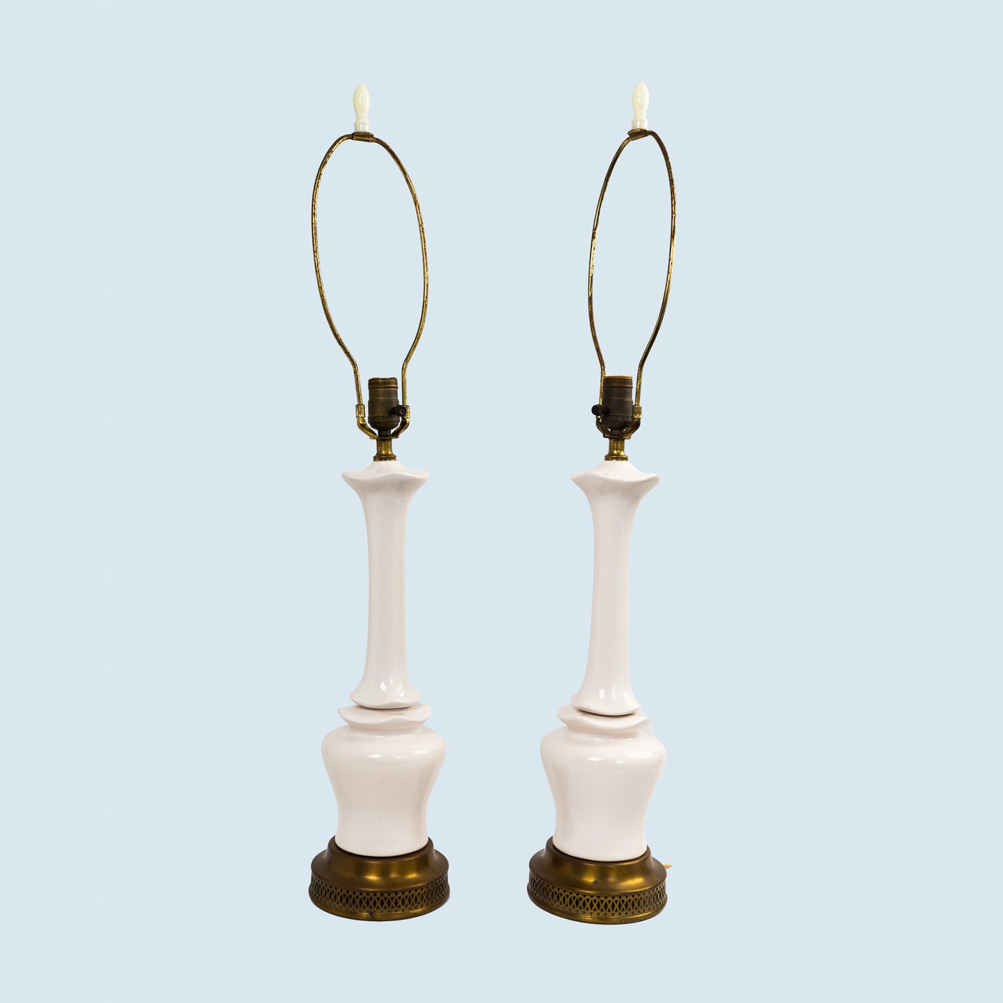 Pair of vintage mid-century off-white ceramic chinoiserie lamp bases with original harps and finials, circa 1950s–1960s.