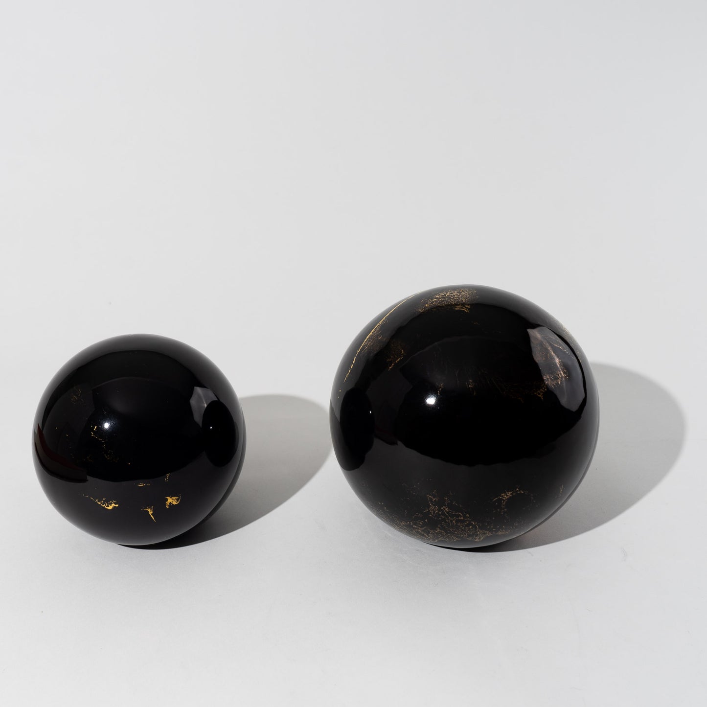 Vintage Black and Gold Ceramic Globes - A Pair