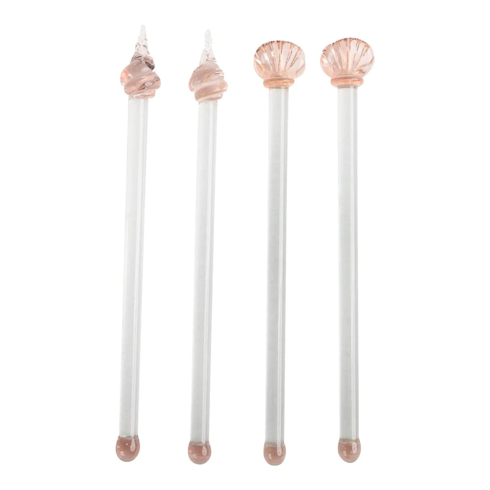 Set of four vintage glass drink stirrers with seashell designs in light pink and clear glass, designed by Georges Briard.