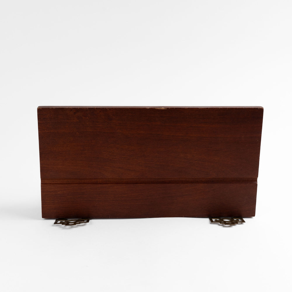 
                  
                    Vintage mid-century modern wall shelf with cherry wood surface, brass supports, and raised edge for displaying art

                  
                