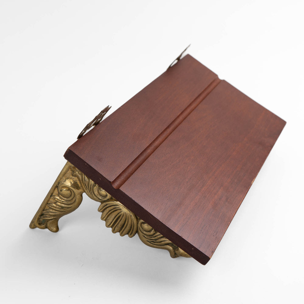 
                  
                    Vintage mid-century modern wall shelf with cherry wood surface, brass supports, and raised edge for displaying art
                  
                