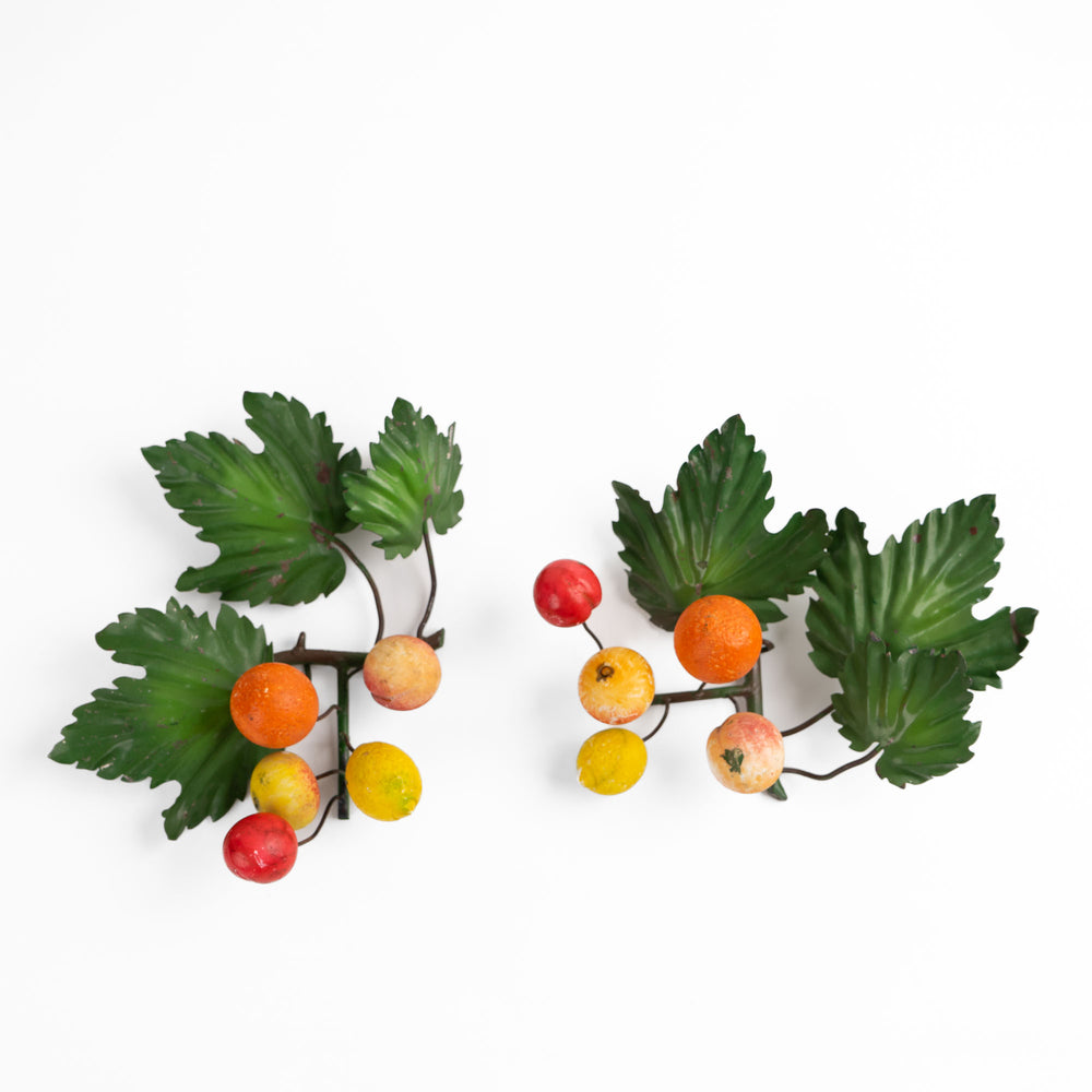 
                  
                    Pair of vintage Italian tole metal wall art with painted citrus fruits and green leaves in orange, yellow, red, and green colors
                  
                