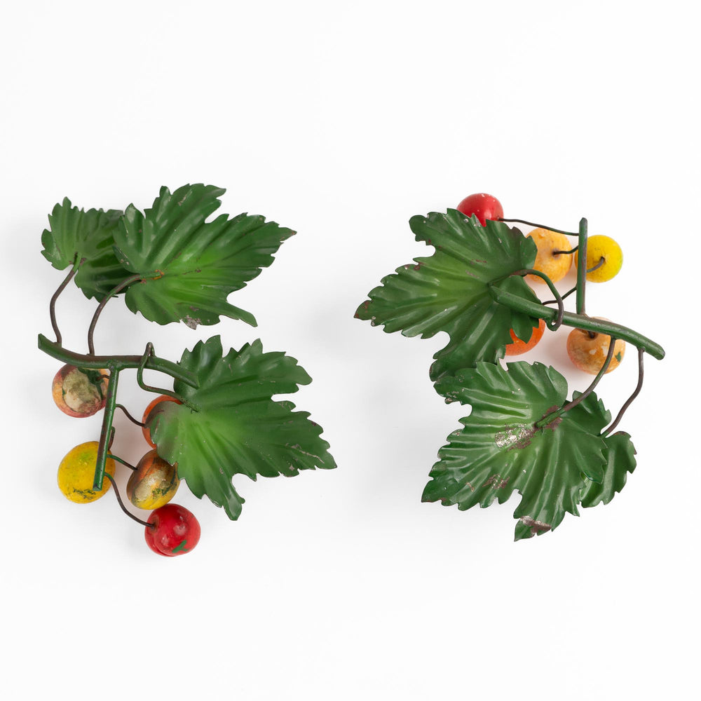 
                  
                    Pair of vintage Italian tole metal wall art with painted citrus fruits and green leaves in orange, yellow, red, and green colors
                  
                