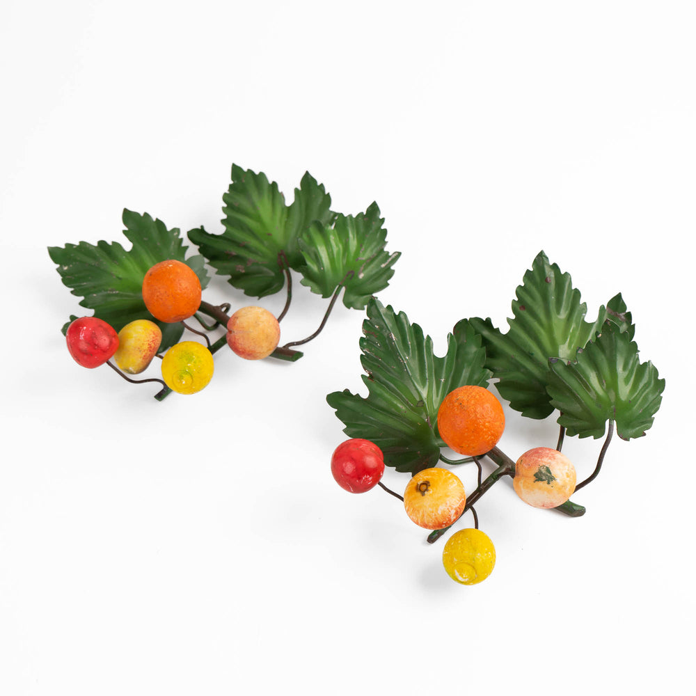
                  
                    Pair of vintage Italian tole metal wall art with painted citrus fruits and green leaves in orange, yellow, red, and green colors
                  
                