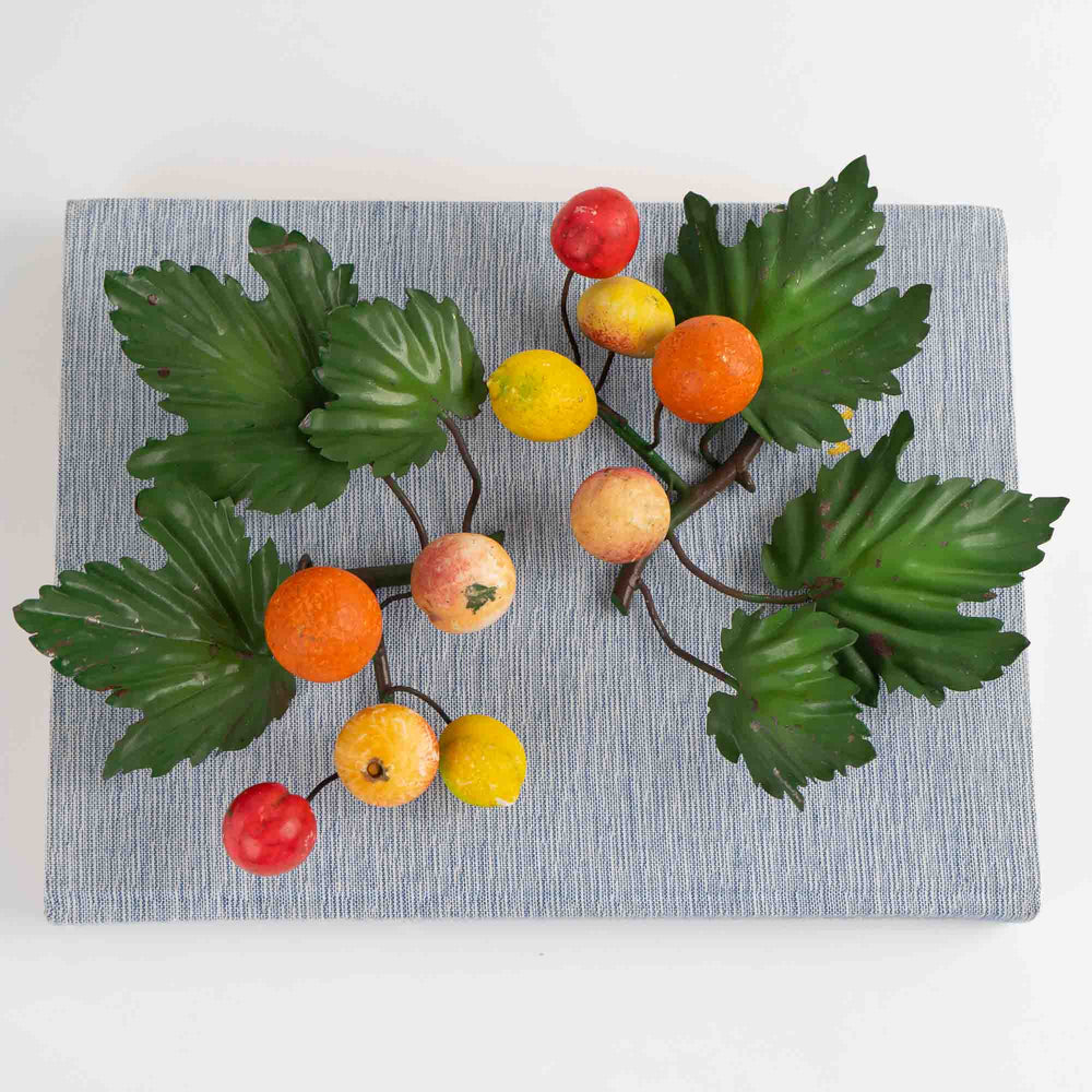 
                  
                    Pair of vintage Italian tole metal wall art with painted citrus fruits and green leaves in orange, yellow, red, and green colors
                  
                