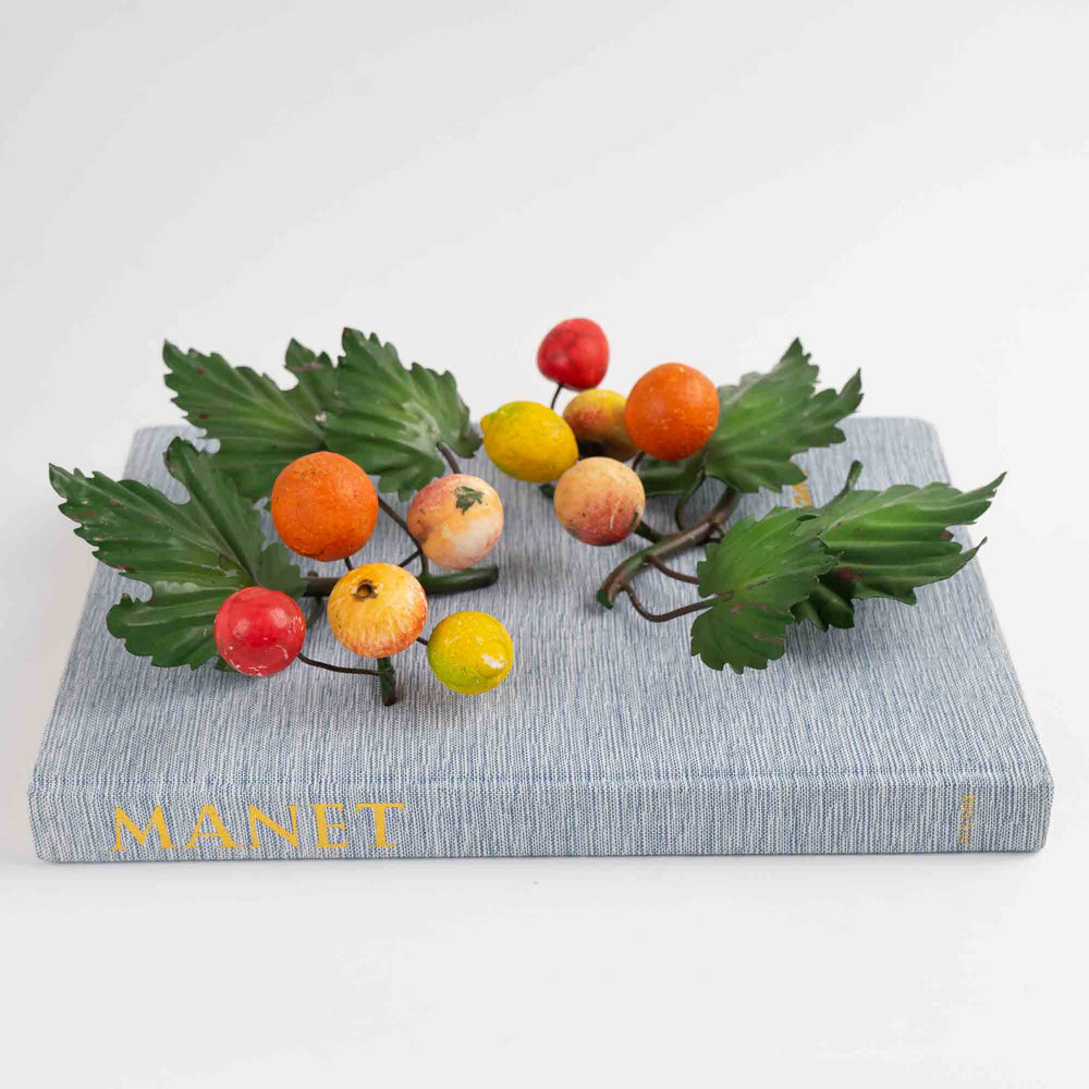 
                  
                    Pair of vintage Italian tole metal wall art with painted citrus fruits and green leaves in orange, yellow, red, and green colors
                  
                