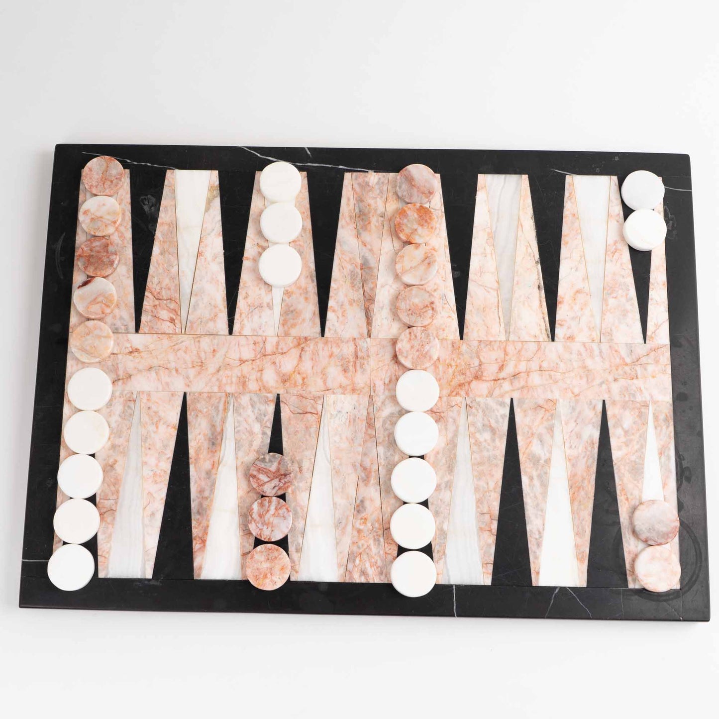 Vintage natural marble backgammon set featuring pink, white and black stone board with matching marble playing pieces