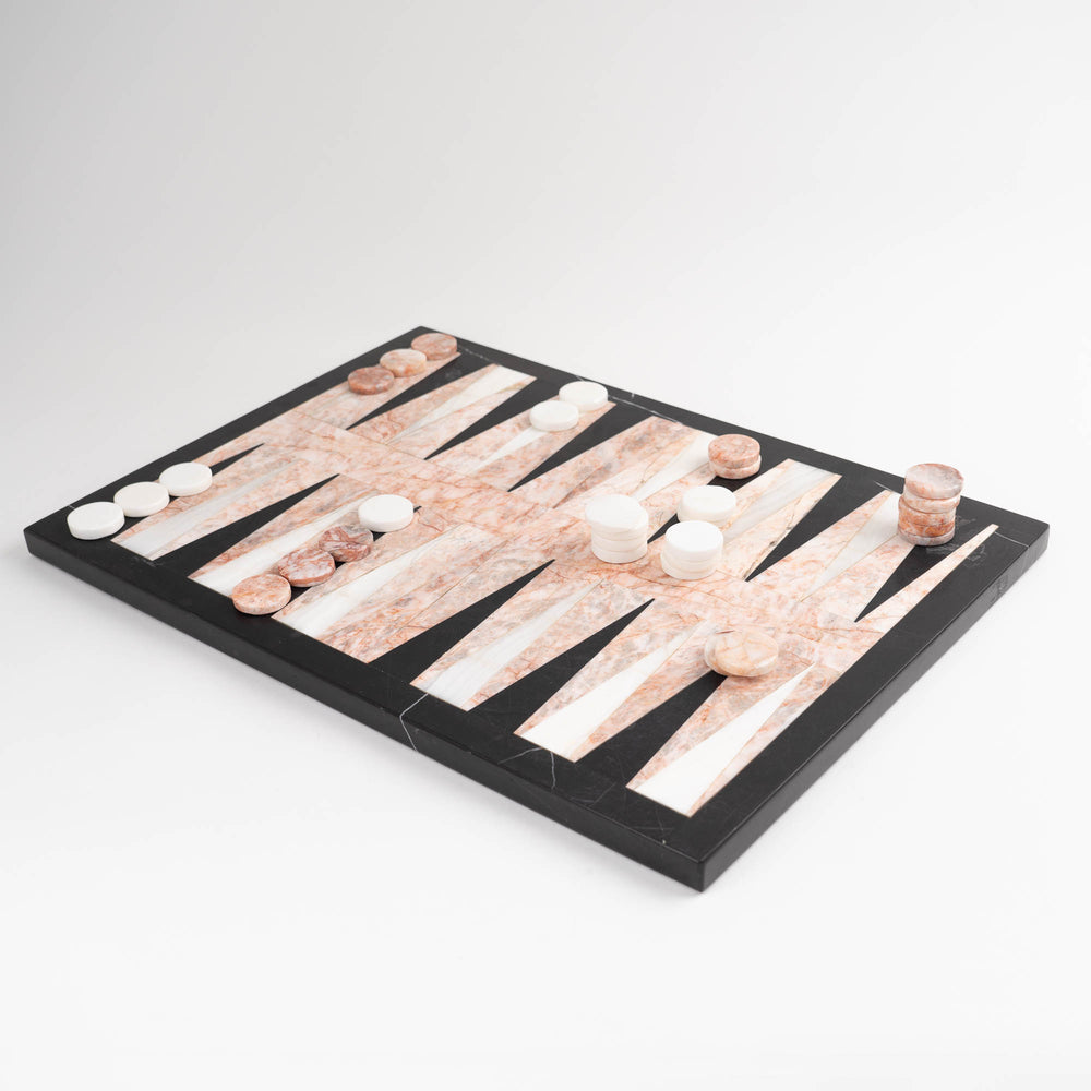 
                  
                    Vintage natural marble backgammon set featuring pink, white and black stone board with matching marble playing pieces
                  
                