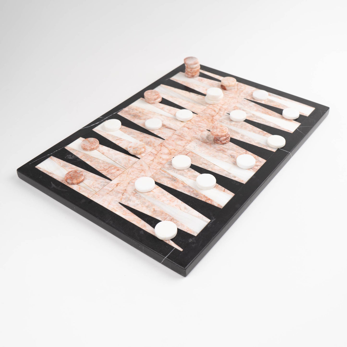 Vintage natural marble backgammon set featuring pink, white and black stone board with matching marble playing pieces