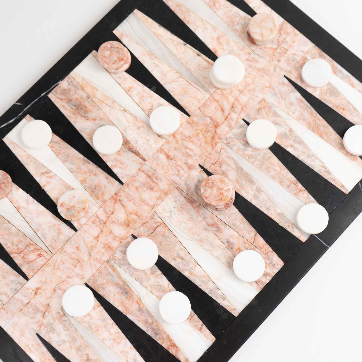 Vintage natural marble backgammon set featuring pink, white and black stone board with matching marble playing pieces
