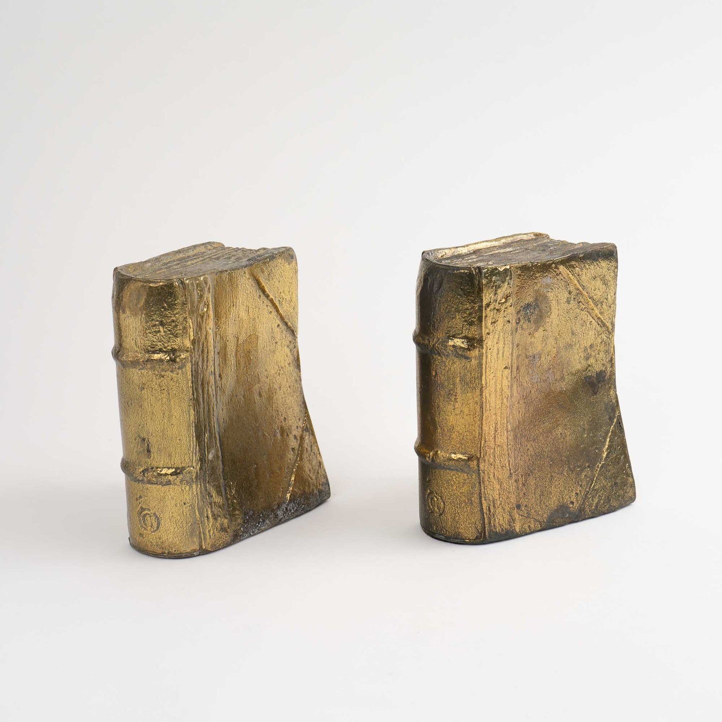 Pair of vintage brass bookends shaped like books