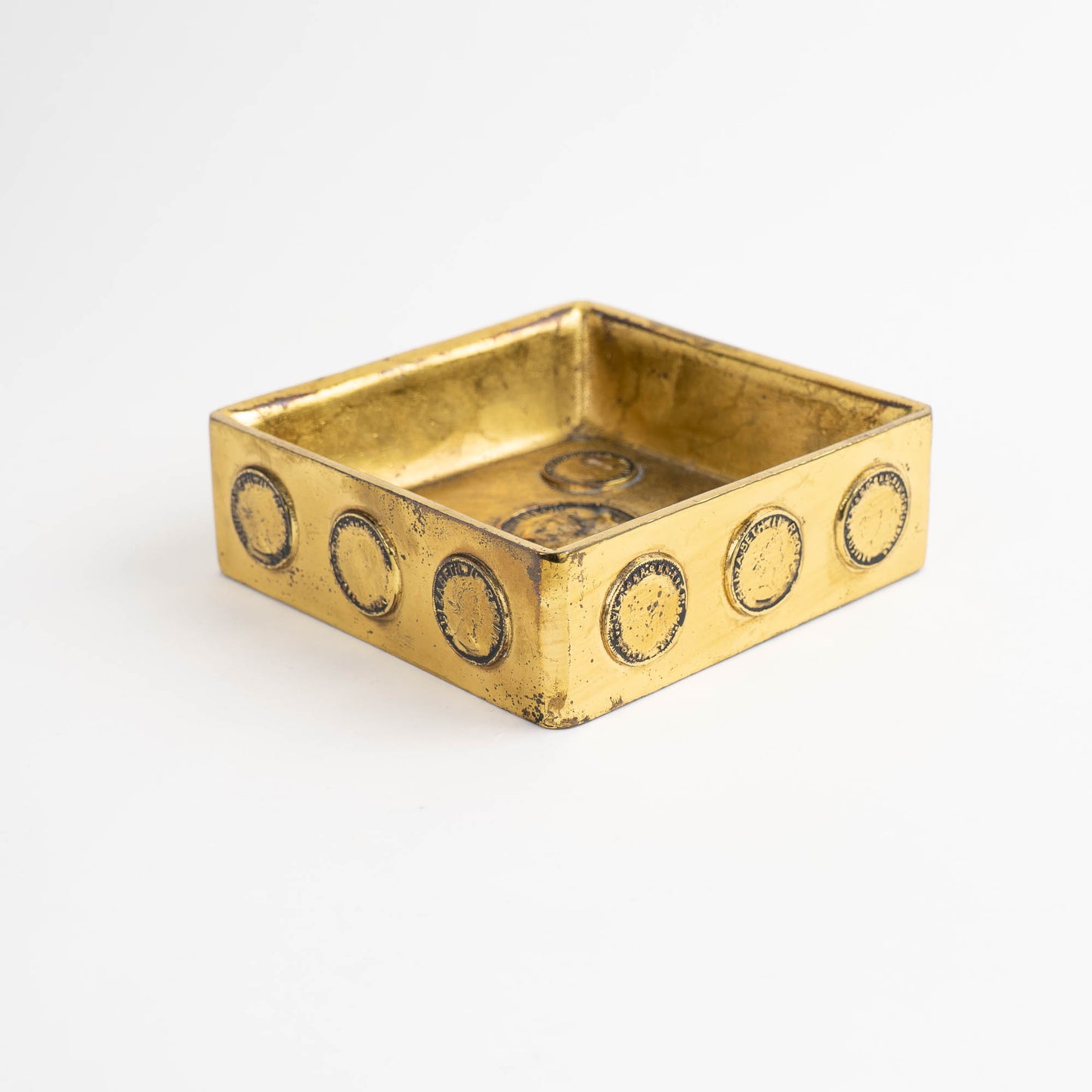 Vintage square brass ashtray featuring decorative historic Napoleon and Elizabeth coins, repurposed as jewelry catchall